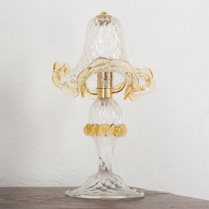 Clear Murano glass table lamp with artistic amber decoration, handmade Made in Italy