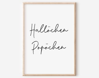 May include: A white framed print with black calligraphy that reads "Hallöchen Popochen".