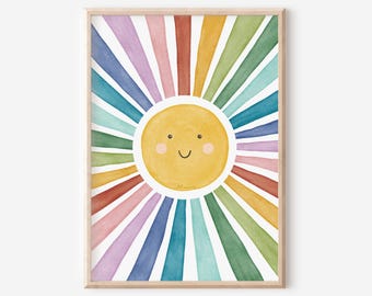 May include: Watercolor art print of a smiling sun with colorful rays in a wooden frame. The sun is yellow with a smiling face. The rays are in shades of red, orange, yellow, green, blue, and purple.
