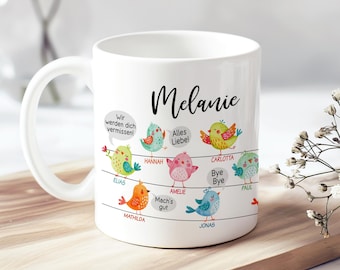 May include: A white ceramic mug featuring a colorful illustration of several small birds perched on thin black lines. The name Melanie is printed at the top in black script. Each bird is labeled with a name and includes speech bubbles with German text.