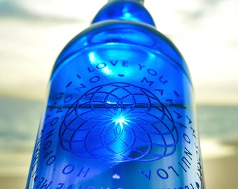 Ho'oponopono Lotus Circle - Blaue Glas Wasserflasche