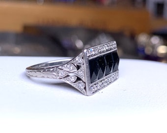 Antique onyx and diamond ring