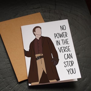 May include: A white card with a cartoon illustration of a person wearing a brown coat and pants. The text on the card reads "No power in the verse can stop you."