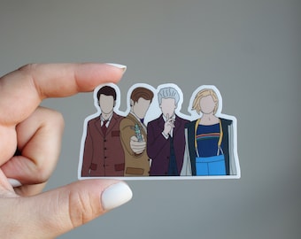 May include: A sticker featuring four cartoon illustrations of the Doctor from the British science fiction television series Doctor Who. The characters are depicted in their iconic attire, including a brown suit, a brown jacket, a purple suit, and a blue dress.