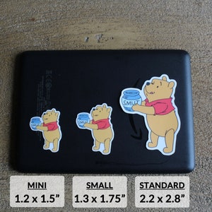 May include: Three Winnie the Pooh stickers with the text "SMUT" on a blue jar. The stickers are available in three sizes: mini (1.2 x 1.5 inches), small (1.3 x 1.75 inches), and standard (2.2 x 2.8 inches).