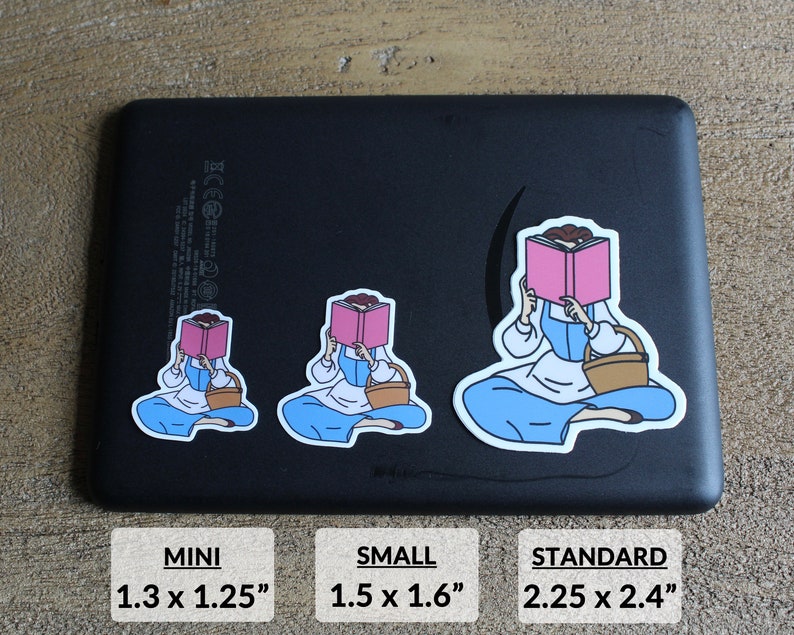 May include: Three different sizes of a sticker featuring a cartoon illustration of a woman sitting with a book covering her face. The sticker is available in mini, small, and standard sizes. The mini sticker is 1.3 inches by 1.25 inches. The small sticker is 1.5 inches by 1.6 inches. The standard sticker is 2.25 inches by 2.4 inches.
