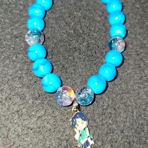 Sailor mercury charm on blue and crystal beads
