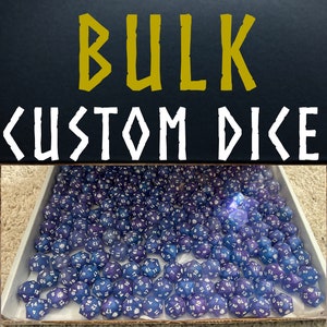 May include: A close-up of a tray filled with a large quantity of custom dice. The dice are blue and purple with white numbers. The text "BULK CUSTOM DICE" is visible at the top of the image.