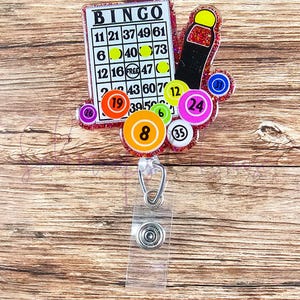 Carrete de insignias de bingo, carrete de insignias de actividades para personas mayores, carrete de insignias de coordinador de actividades, carrete de insignias de maestro, carrete de insignias de oficina, intercambiable