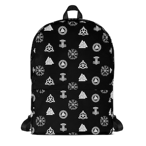 May include: Black backpack with a repeating white pattern of Viking symbols, including the Valknut, Mjolnir, and the Vegvisir. The backpack has a top handle, adjustable shoulder straps, and a front pocket. The bag is made of a durable material.