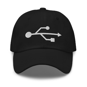 May include: A black baseball cap with a white embroidered USB symbol on the front.