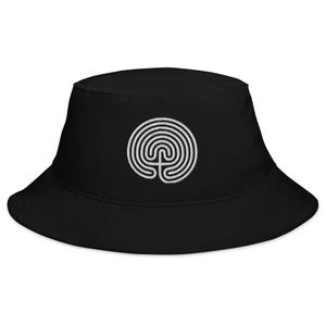 May include: Black bucket hat with a white embroidered labyrinth design.