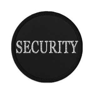 May include: Black round patch with white embroidered text that reads "SECURITY".