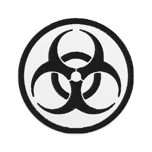 Peut inclure: Patch de symbole de risque biologique noir et blanc avec un contour circulaire.