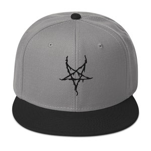 May include: A gray and black baseball cap with a black pentagram embroidered on the front.