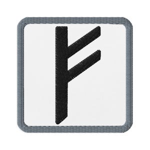 May include: Embroidered patch featuring a black rune symbol on a white background. The patch has a square shape with a gray border. The rune is a stylized vertical line with two diagonal lines extending from it.