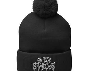In The Shadows Pom-Pom Beanie – Horror Gothic Hat, Dark Gift for Alt Fashion Lovers & Halloween Fans