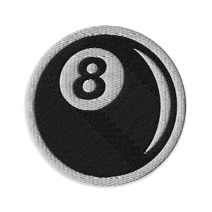 May include: Embroidered patch featuring a black and white 8-ball design. The number 8 is in white, centered on the black ball. The patch has a circular shape with a gray border.