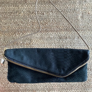 Henri bendel clutch shop