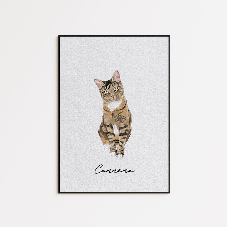 May include: Watercolor painting of a tabby cat with brown and black stripes, white chest, and green eyes. The cat is sitting upright with its head tilted. The name "Carrera" is written in cursive below the cat.