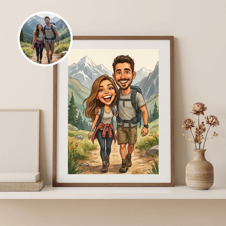 May include: A framed cartoon print of a couple hiking on a mountain trail, with a smaller circular image of the couple hiking in the upper left corner. The couple is smiling and wearing backpacks. The print is in a wooden frame.