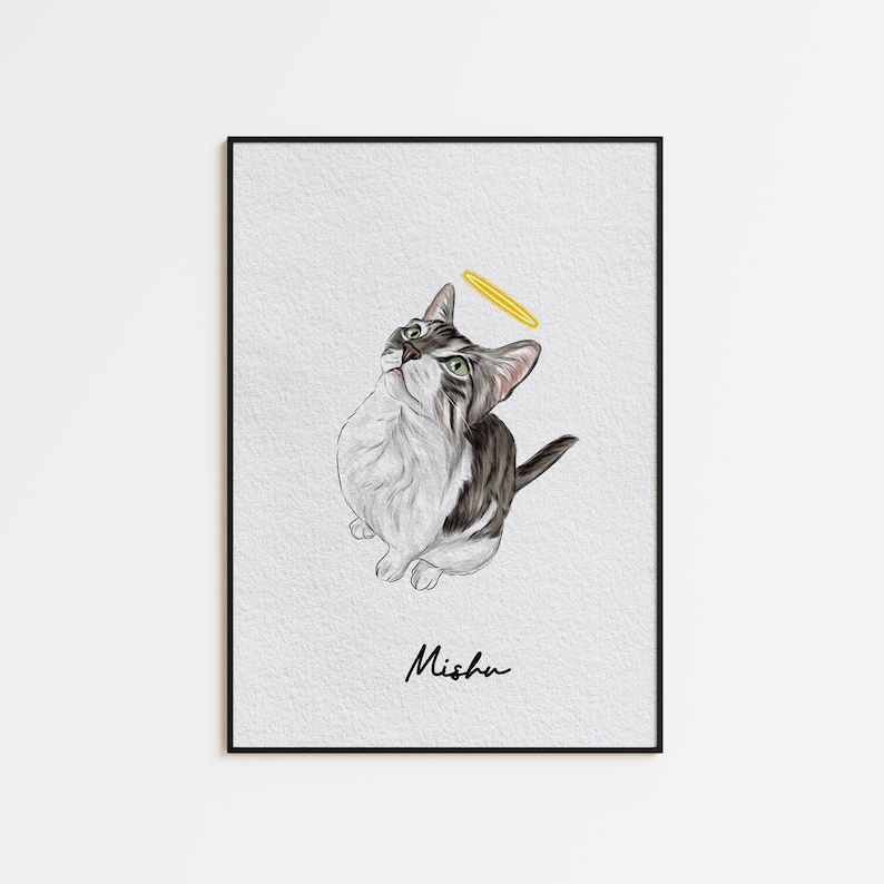 May include: A framed art print featuring a cat with a halo. The cat is depicted in shades of gray and white, with green eyes, looking upwards. A yellow halo hovers above its head. The name "Misha" is written in cursive below the cat.