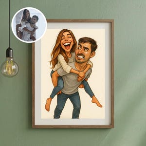 May include: A framed cartoon print depicts a woman laughing while being carried piggyback by a man with a surprised expression. The woman wears a white sweater and blue jeans. The man wears a gray shirt and blue jeans. A smaller inset image shows the couple in a photograph.