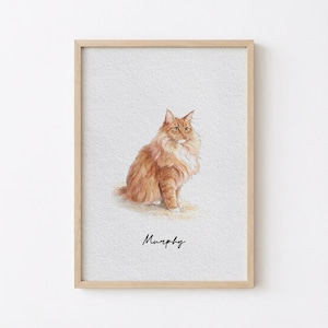 May include: Watercolor painting of a fluffy orange cat with white accents, sitting upright. The cat has long fur and a detailed depiction. The name "Murphy" is written in cursive below the cat. The artwork is framed in a light wood frame.