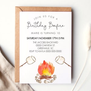 May include: A white invitation card with a watercolor illustration of a campfire with two marshmallows on sticks. The text on the card reads "Join us for a Birthday Bonfire, Marie is turning 10, Saturday I November 17th I 5 PM, The Jacobs Backyard, 0000 Oakview St., Greenville, SC, RSVP to Kayla (000) 000-0000".