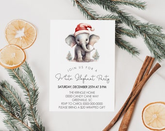 Può includere: Un biglietto d'invito bianco per una White Elephant Party. La carta presenta un'illustrazione ad acquerello di un elefante grigio con un cappello da Babbo Natale. Il testo sulla carta recita "Join us for a White Elephant Party" e include i dettagli dell'evento.