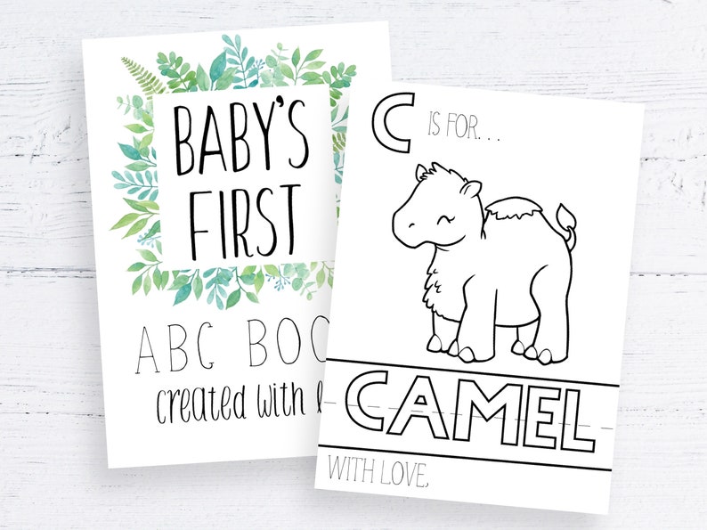 Może przedstawiać: Dwie białe karty. Jedna m&oacute;wi "Baby's First ABC Book" z obramowaniem z liści. Druga ma ilustrację wielbłąda i tekst "C is for Camel". Ilustracje są czarno-białe.