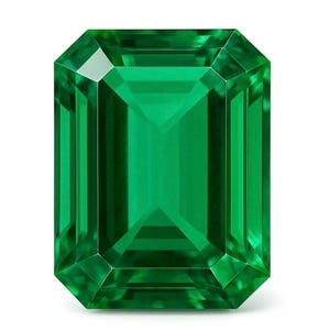 Peut inclure: Une pierre précieuse de taille émeraude, d'une couleur vert profond. La pierre rectangulaire présente des facettes taillées avec précision qui réfléchissent la lumière, créant un éclat brillant. La gemme est posée sur un fond blanc pur, soulignant sa clarté et sa couleur.