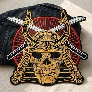 May include: Embroidered patch featuring a skull wearing a samurai helmet, with two crossed swords. The design is in gold, black, and red, with intricate details. The patch is likely for jackets or bags.