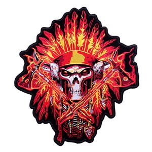 May include: Embroidered patch featuring a skull wearing a Native American headdress and holding crossed tomahawks. The design incorporates red, yellow, and black colors, with flames and feathers. The patch has a black border.