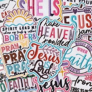 May include: A collection of embroidered patches with religious themes. The patches feature phrases like "Jesus Lord", "Make Heaven Crowded", and "Faith Begins". The patches are in various colors, including blue, pink, and white, with decorative borders.
