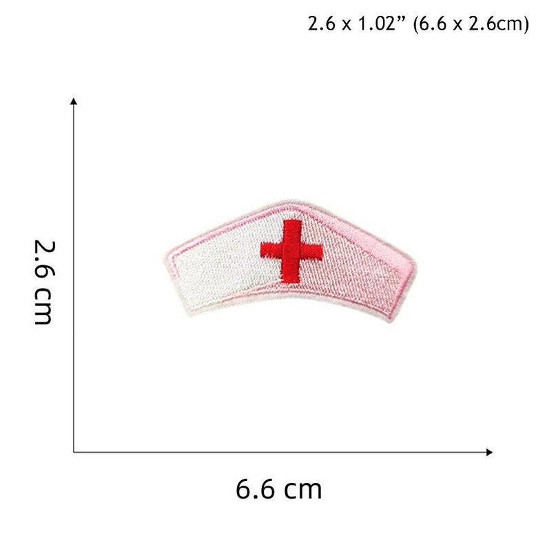 May include: White and pink embroidered nurse's cap patch with a red cross. The patch is 2.6 inches by 1.02 inches (6.6 cm by 2.6 cm).