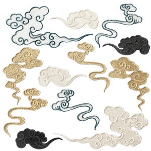 May include: A selection of embroidered cloud patches in white, gold, black, and teal. The patches showcase detailed stitching and swirling designs, ideal for fabric embellishment or craft projects.