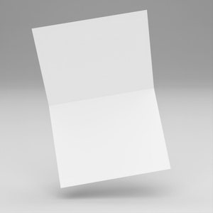 May include: A white folded card blank on both sides. The card is folded in half and is floating in the air.