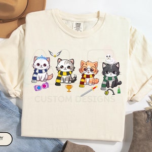Comfort Colors® Cute Wizarding School House Cats T-Shirt, Universal Vacation T-Shirt, Wizard World Gift, Vintage Wizard Houses Shirt