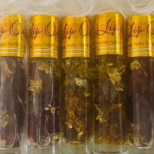 Lip oil infused herbs and essential oils.