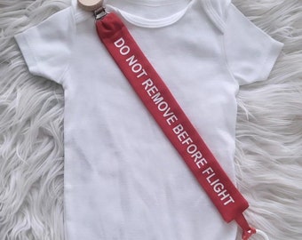 Do Not Remove Before Flight funny airplane dummy / pacifier clip