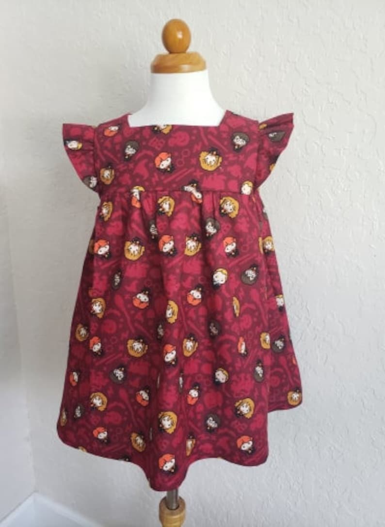 Vestido de algodón con temática de mago disponible en tallas 0-3 meses 5Y imagen 2