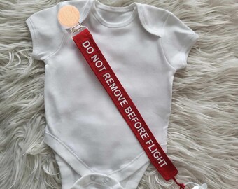 Do Not Remove Before Flight funny airplane dummy / pacifier clip