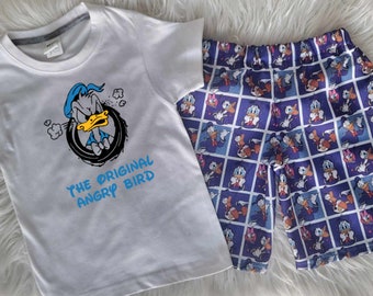 Adorable conjunto de pantalones cortos y camiseta/mono de pato para niños - Disponible en tallas 1Y - 8Y