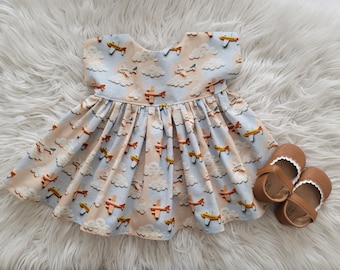 Baby girls soft cotton airplane flight themed dress - Available in sizes 3 months - 5Y