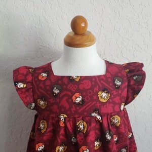 Vestido de algodón con temática de mago disponible en tallas 0-3 meses 5Y imagen 3