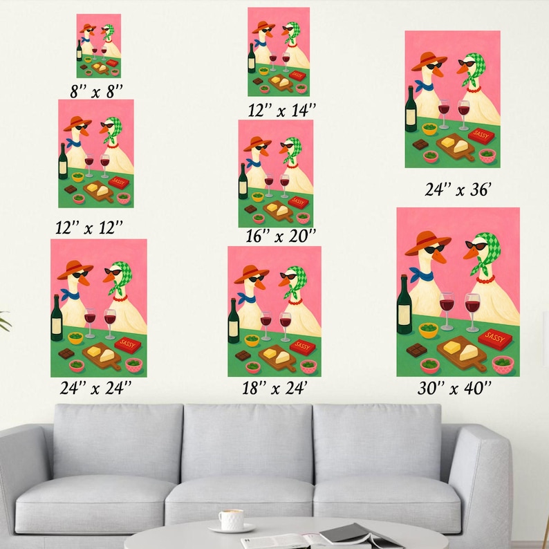 May include: Whimsical artwork featuring two geese wearing sunglasses and scarves, enjoying wine and snacks. The geese are depicted with a bottle of wine, glasses, cheese, and the word "SASSY" on a pink background. Available in various sizes.