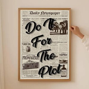 May include: A framed print featuring a vintage newspaper design with the words "Do It For The Plot" in bold, black lettering. The print has a light brown wooden frame and includes various newspaper headlines and images.