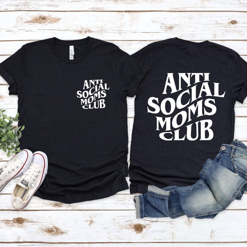May include: Two black t-shirts with the text "Anti Social Moms Club" in white. One shirt has the text on the front, the other on the back.