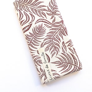Personalized family record book cover with dark red foliage pattern, customizable book cover
